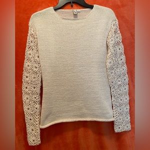 MG Studio brand cream colored sweater in a size large